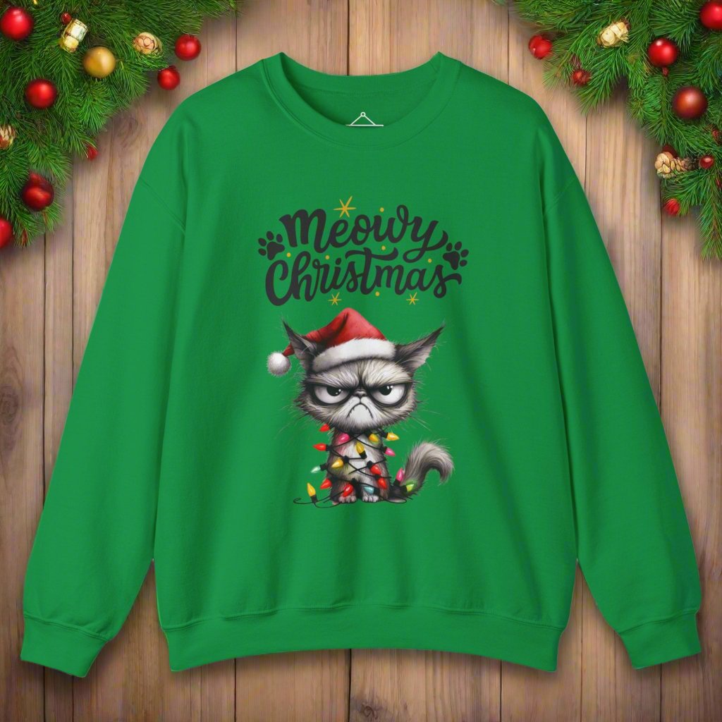 Grumpy Meowy Christmas Sweatshirt in irish green with the words Meowy Christmas and a grumpy cat with a red hat and wrapped up in lights