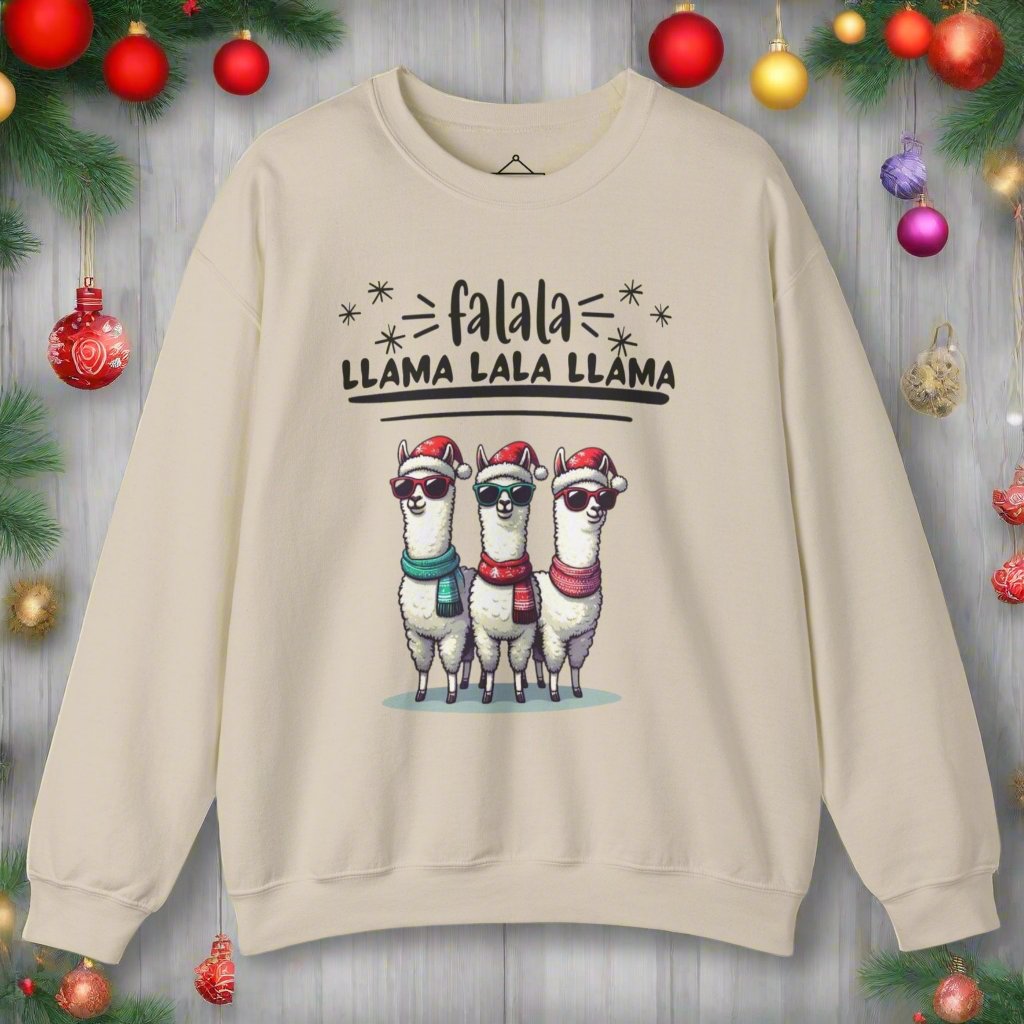 The Falala Llama Christmas Sweatshirt in sand featuring three llamas with scarfs, sunglasses, and winter hats