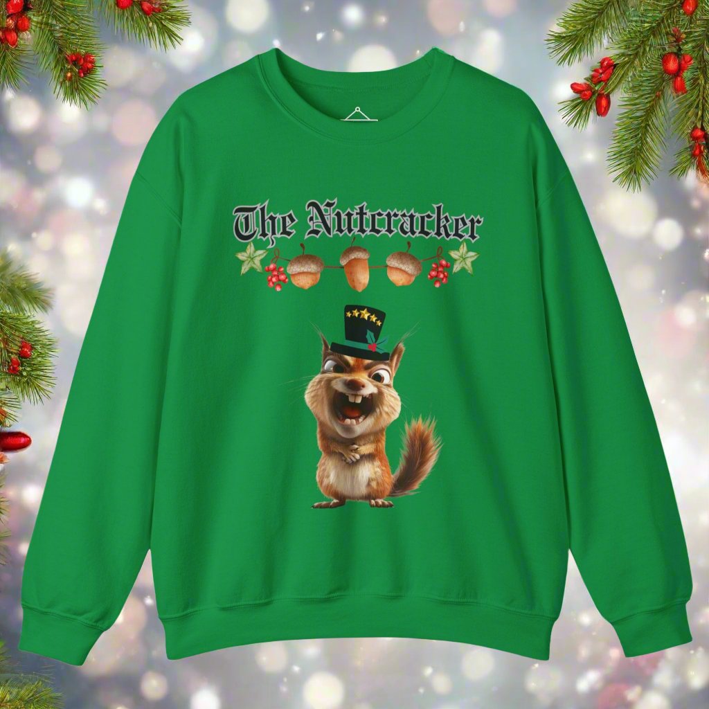 The Nutcracker christmas sweatshirt in irish green featuring a strand of acorns hanging above a squirrel making a goofy face wearing a black top hat with a green ribbon and gold stars