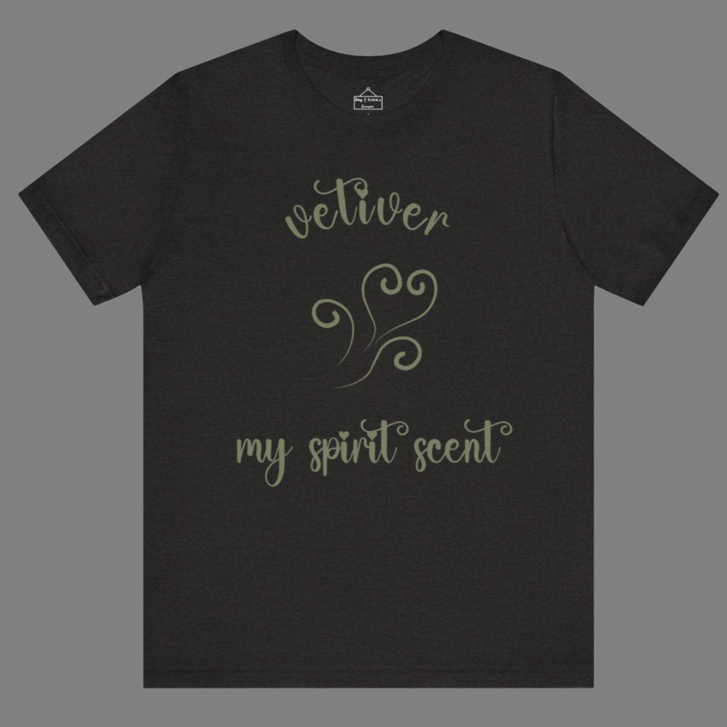 The My Spirit Scent is Vetiver t-shirt in black heather featuring script font and an aroma script heart in a grey-green hue