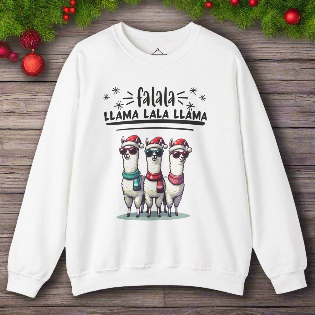 the Falala Llama Christmas Sweatshirt in white featuring three llamas with scarfs, sunglasses, and winter hats